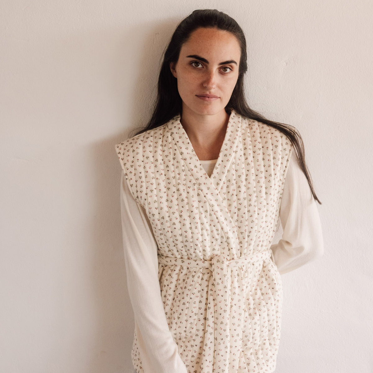 Gilet matelassé en maille à fleurs Chaleco
